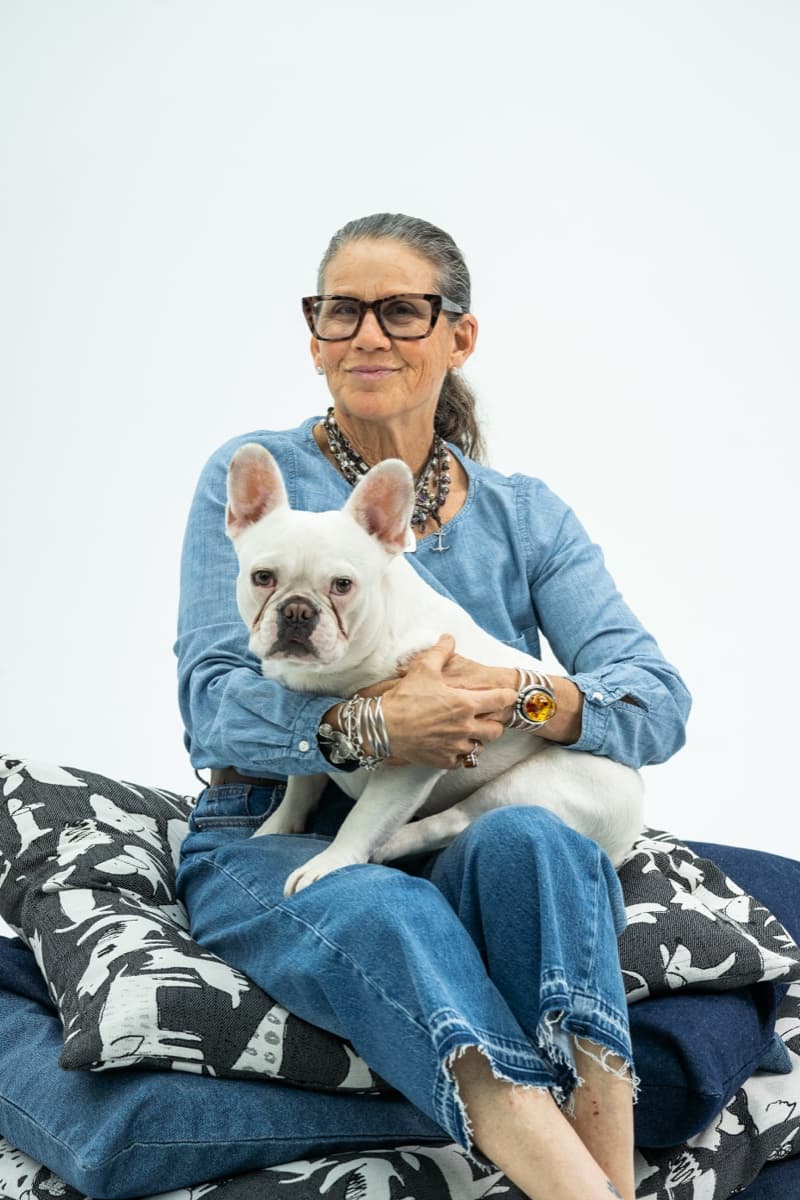 Susan and her co-designer! Every bed is handmade with this much love.